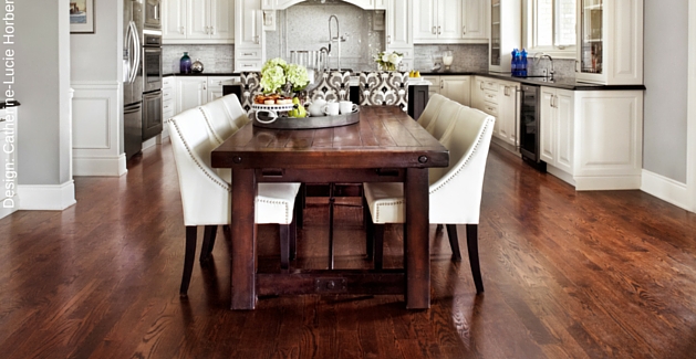 modern farmhouse kitchen hardwood floors featuring large rustic dining table